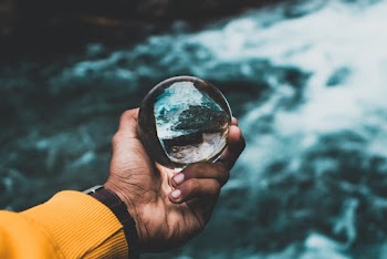 Person Holding Lensball