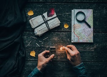 person holding lighted safety match