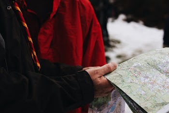 Person Holding Map