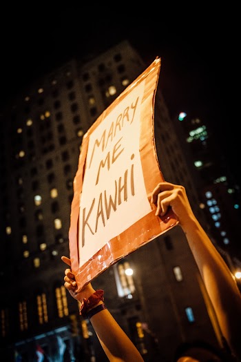 Person Holding Marry Me Kawhi Sign 