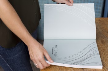 Person Holding Mockup Book