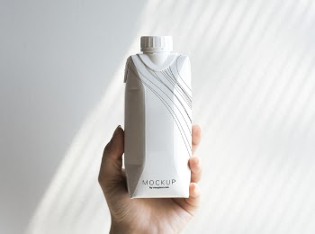 Person Holding Mockup Bottle