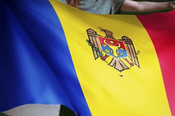 Person holding Moldova flag background, | Free Photo - rawpixel