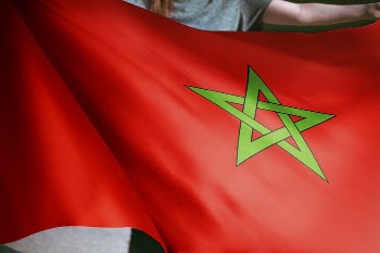 Person holding Morocco flag background, | Free Photo - rawpixel