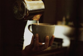 Person Holding Mug