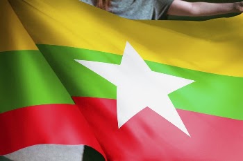 Person holding Myanmar flag background, | Free Photo - rawpixel