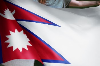 Person holding Nepalese flag background, | Free Photo - rawpixel