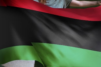 Person holding Pan-African flag background, | Free Photo - rawpixel