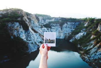 person holding photo