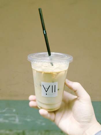 Person Holding Plastic Cup