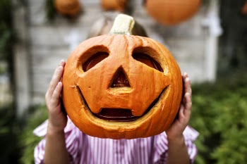 Person Holding Pumpkin