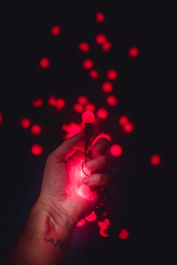 Person Holding Red Led Light