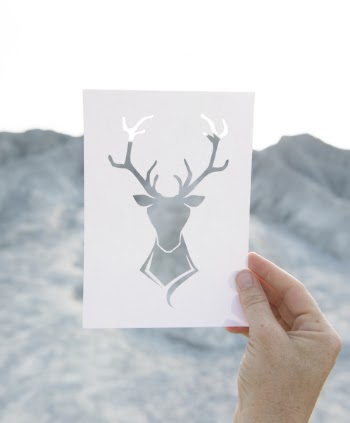 Person Holding Reindeer Artwork