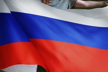 Person holding Russian flag background, | Free Photo - rawpixel
