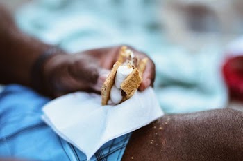 person holding sandwich