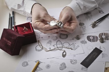 Person Holding Silver-colored Accessory Close-up Photo