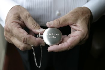 Person Holding Silver-colored Pocket Watch