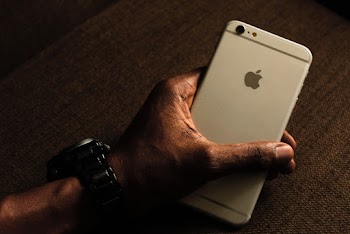 Person Holding Silver Iphone 