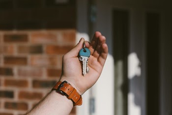 Person Holding Silver Keys