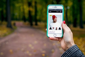 Person Holding Smartphone