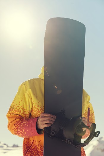 Person Holding Snowboard