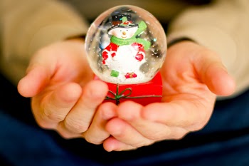 Person Holding Snowman Waterglobe