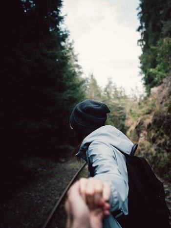 Person Holding Someone's Hand 