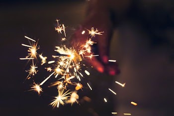person holding sparkler