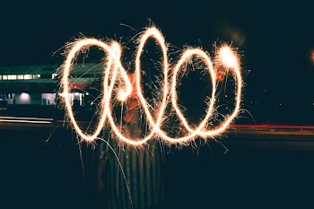 person holding sparkler