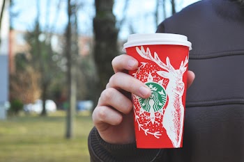Person Holding Starbucks Disposable Tumbler
