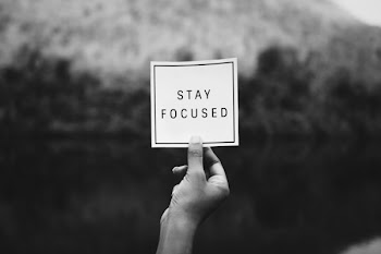 Person Holding Stay Focuseds Paper