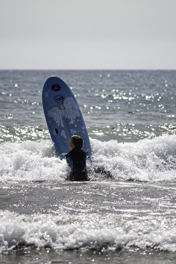 Person Holding Surfboard