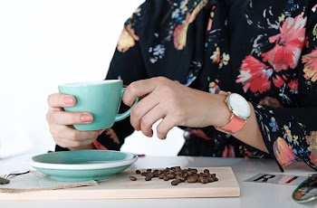 Person Holding Teacup