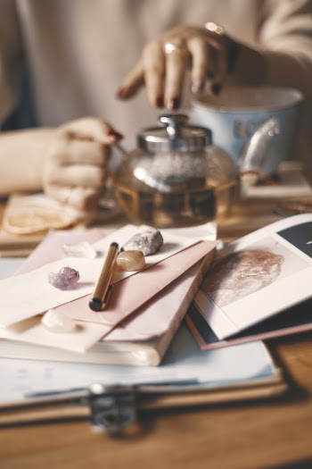 Person Holding Teapot