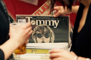 Person Holding Vinyl Record
