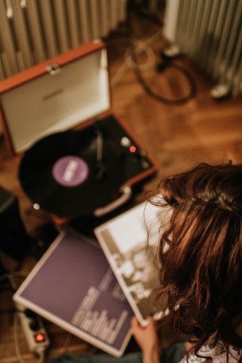 Person Holding Vinyl Sleeve