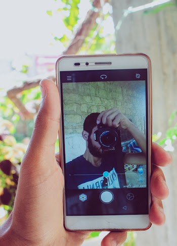 Person Holding White Android Smartphone