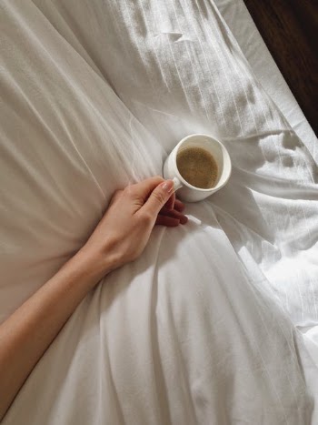 Person Holding White Ceramic Mug With Brown Liquid · Free Stock Photo