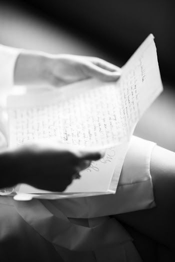 Person Holding White Paper