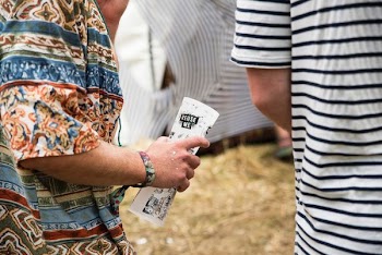 person holding white paper