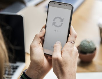 Person Holding White Samsung Galaxy J7 With Black Case