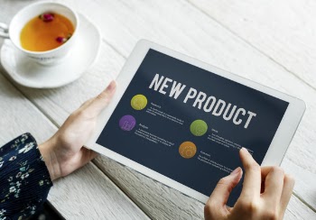 Person Holding White Tablet
