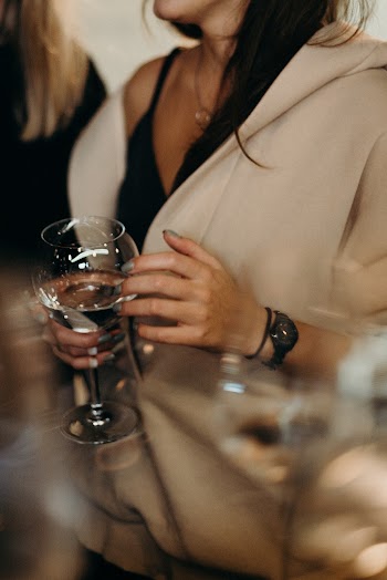 Person Holding Wine Glass