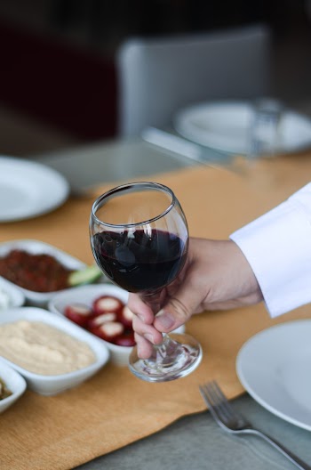 Person Holding Wine Glass