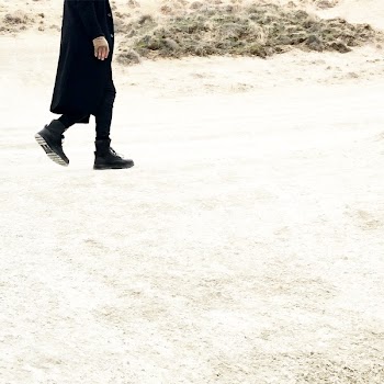 Person In Black Coat