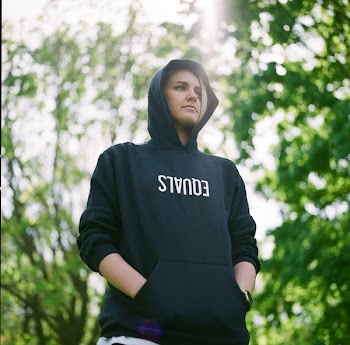 Person in Black Hoodie Shallow Focus Photography
