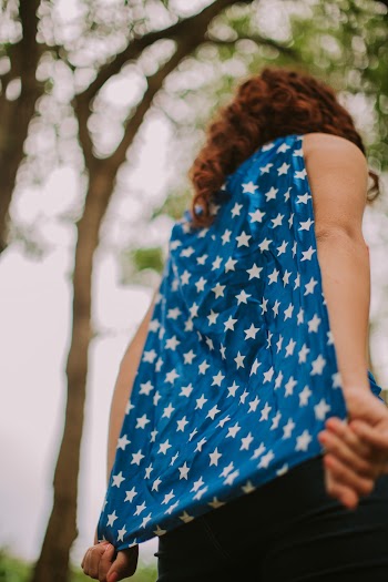 Person in Blue and White Star-print Sleeveless Top