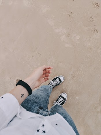 Person In Blue Denim Pants