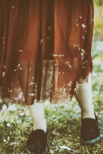 Person In Maxi Skirt And Pair Of Black Slip-on Shoes