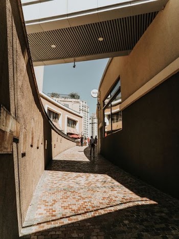 person in narrow street